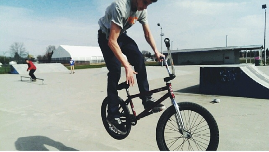 Skatepark scene — BMX and concrete